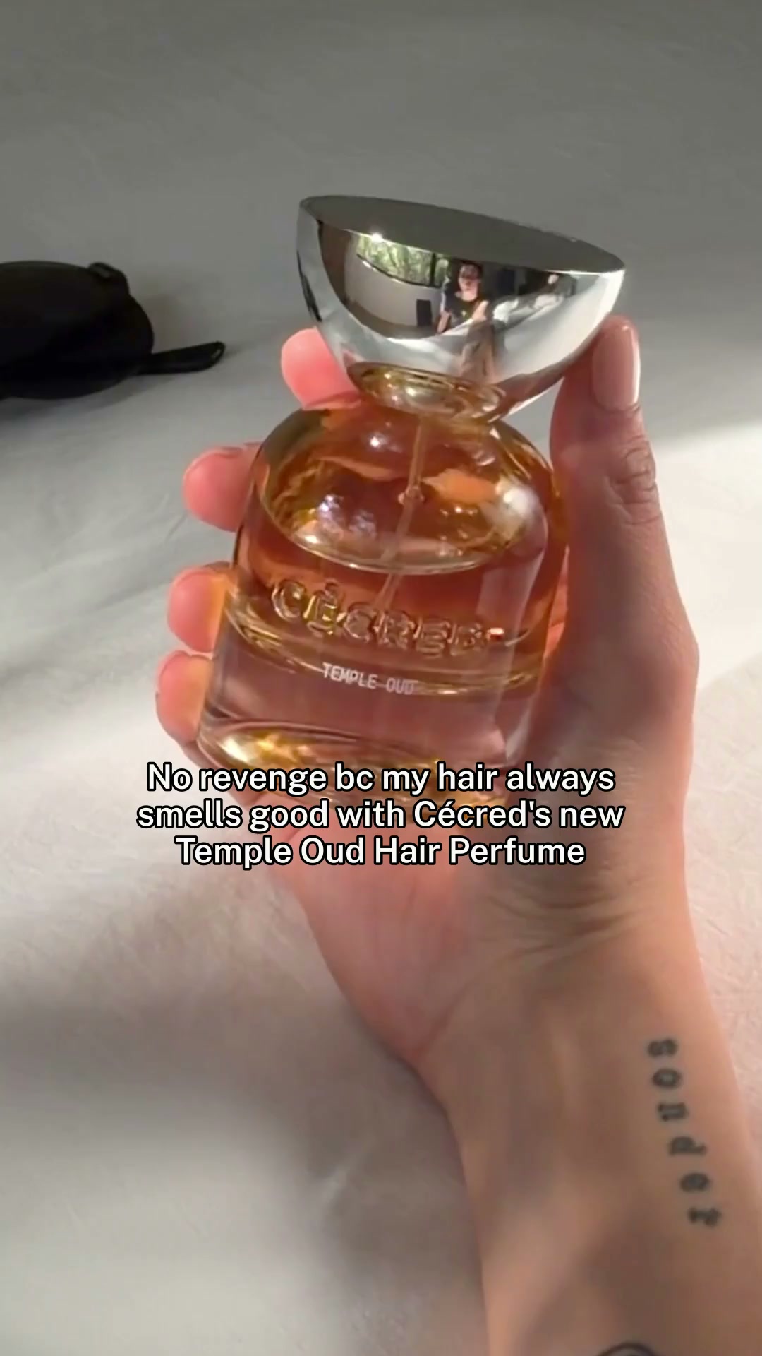 Cecred Facebook ad: New! Temple Oud Hair Perfume