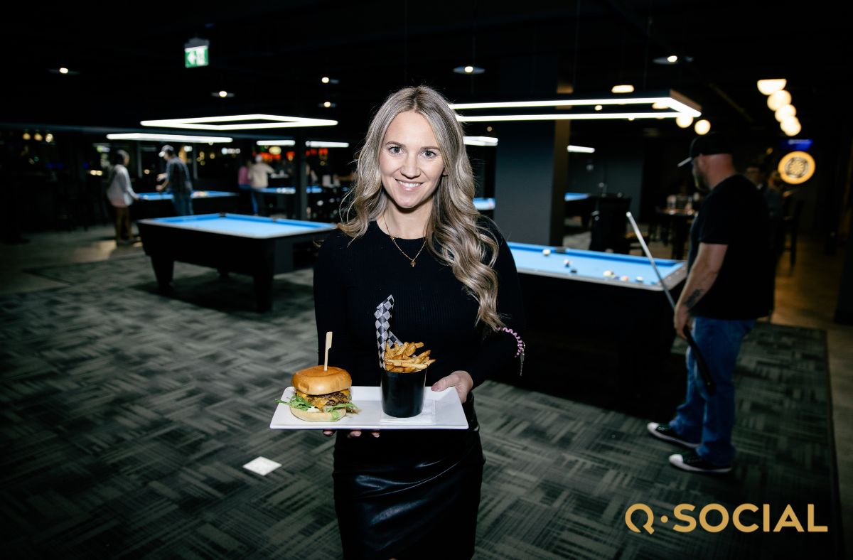 Q Social Facebook ad: Hit the Bullseye With Your Team This Holiday…