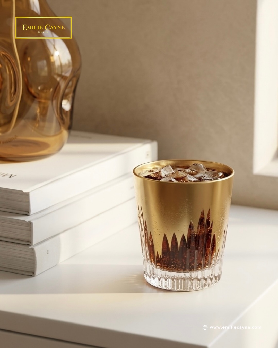 Emilie Cayne Facebook ad: Verres en cristal doré & argenté,signature Emilie Cayne.