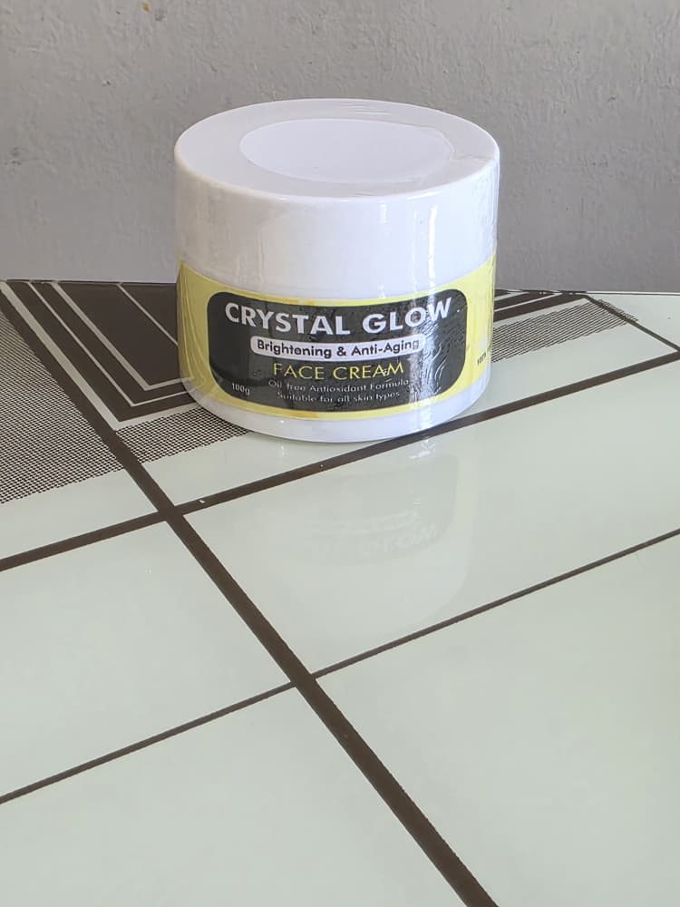 Crystal Glow Skincare Facebook ad: Kiss Sunburn & Wrinkles Good BYE
