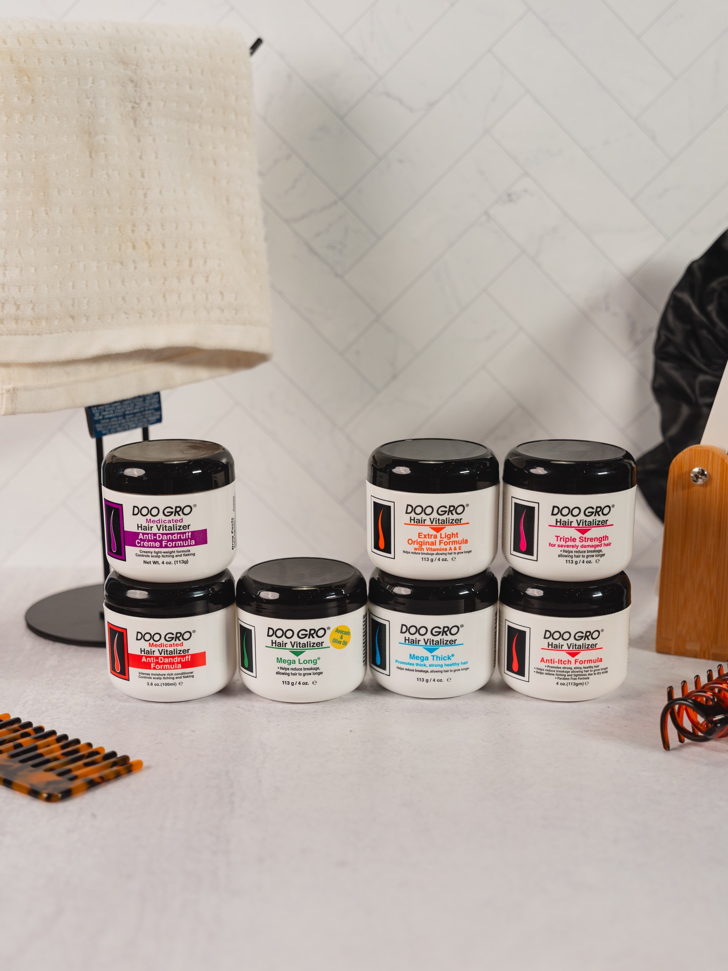 Doo Gro Facebook ad: Each Doo Gro Hair Vitalizer helps seal in…