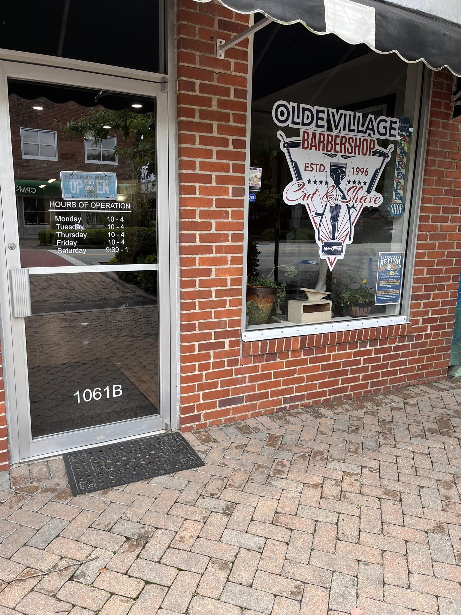 Olde Village Barber Shop Facebook ad: Old fashioned barber shop with over 40 years…