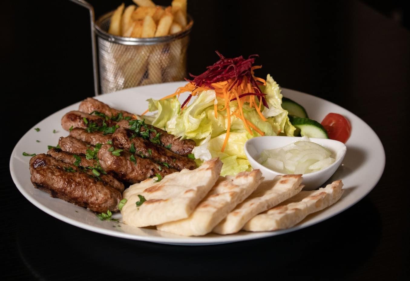 Zoran Cafe Facebook ad: Good food. Great wine.