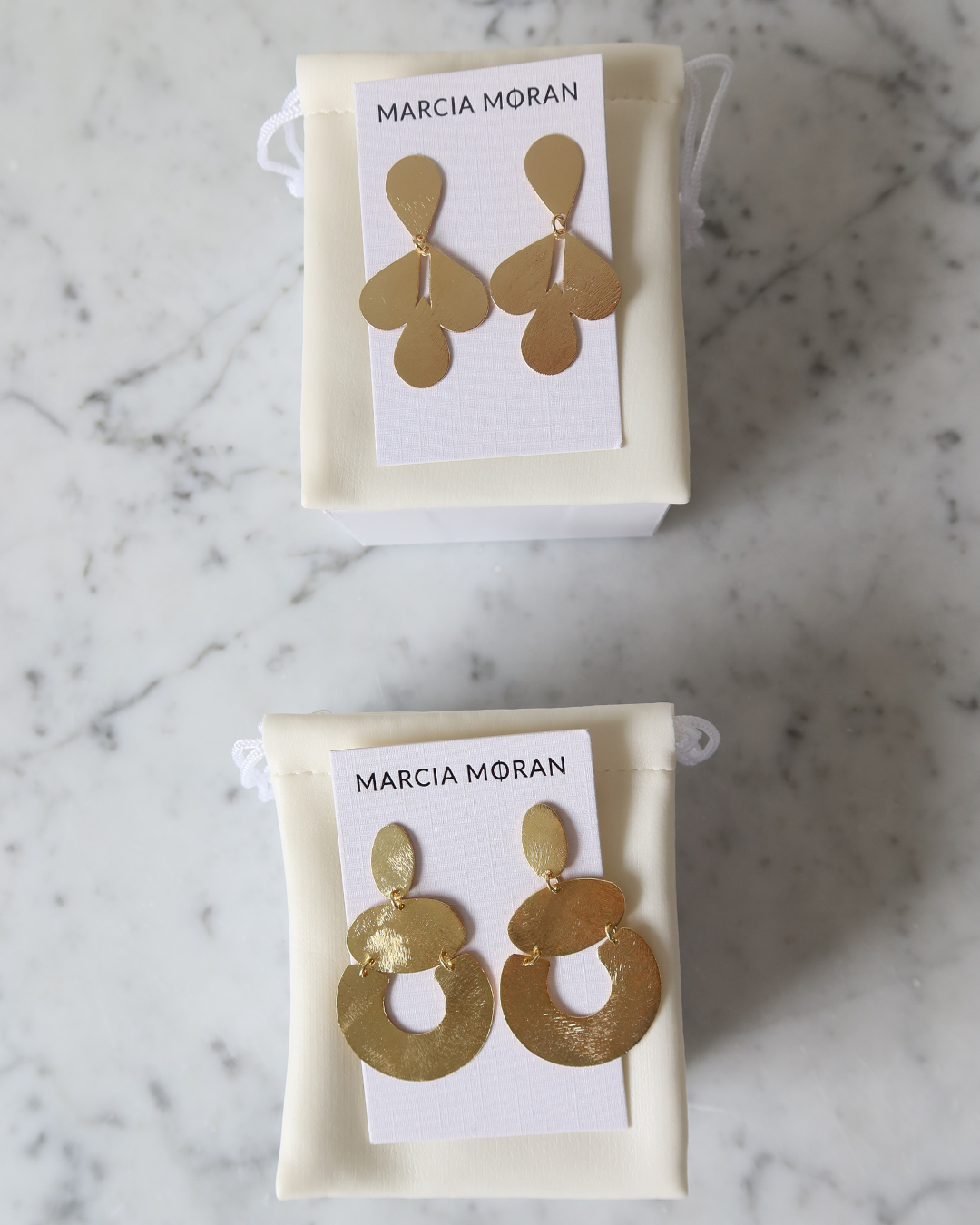 Marcia Moran Facebook ad: No look is complete without jewelry.