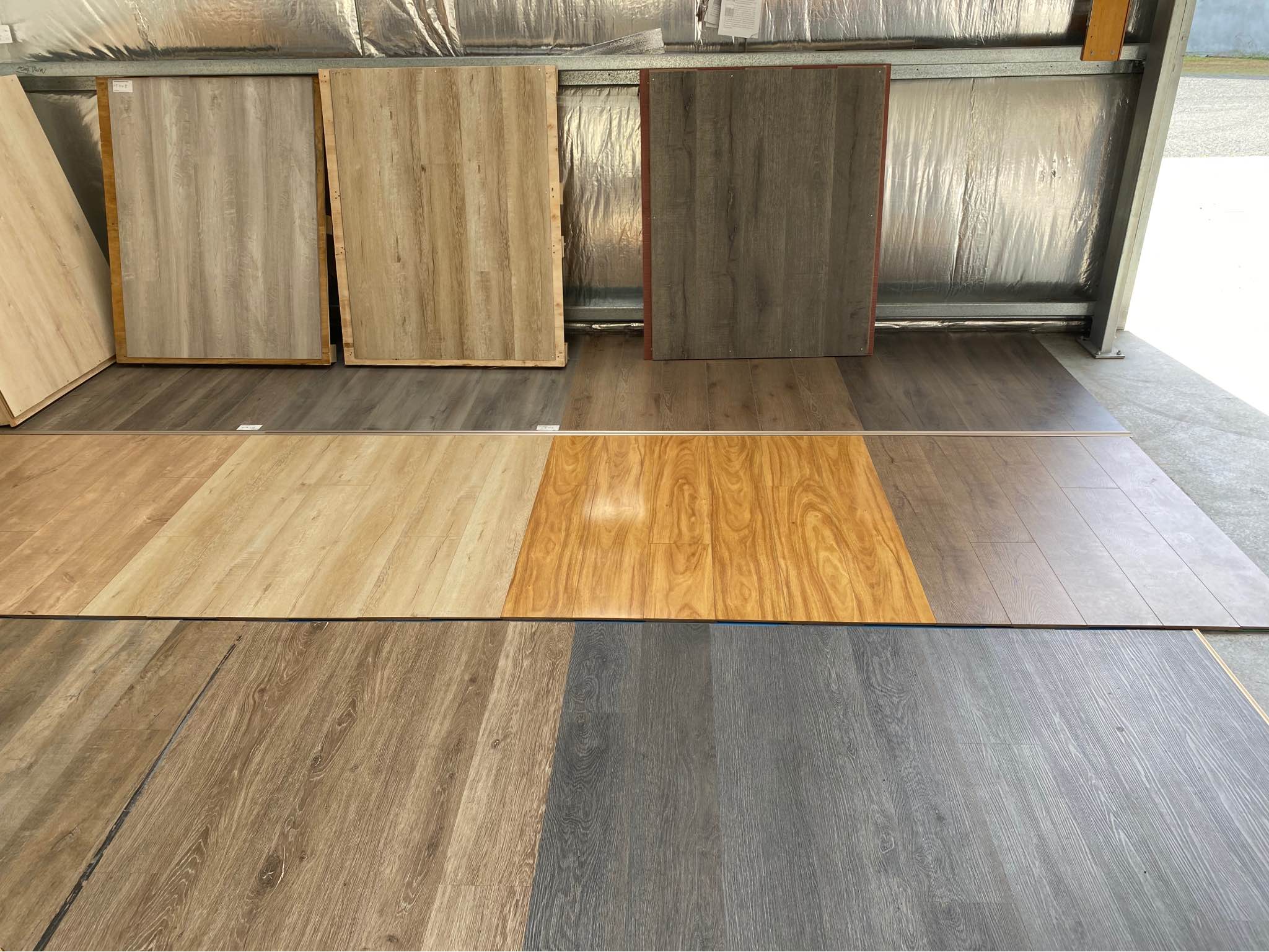 Paul Chen Facebook ad: 12mm laminate flooring, 4+1mm waterproof vinyl plank