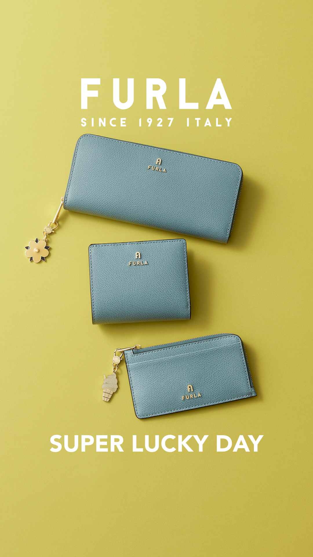 Furla Facebook ad: 最強開運日に向けて、フルラのレザーグッズとチャームで運気も気分もアップ。上質な素材と色とりどりのカラーバリエーションか…