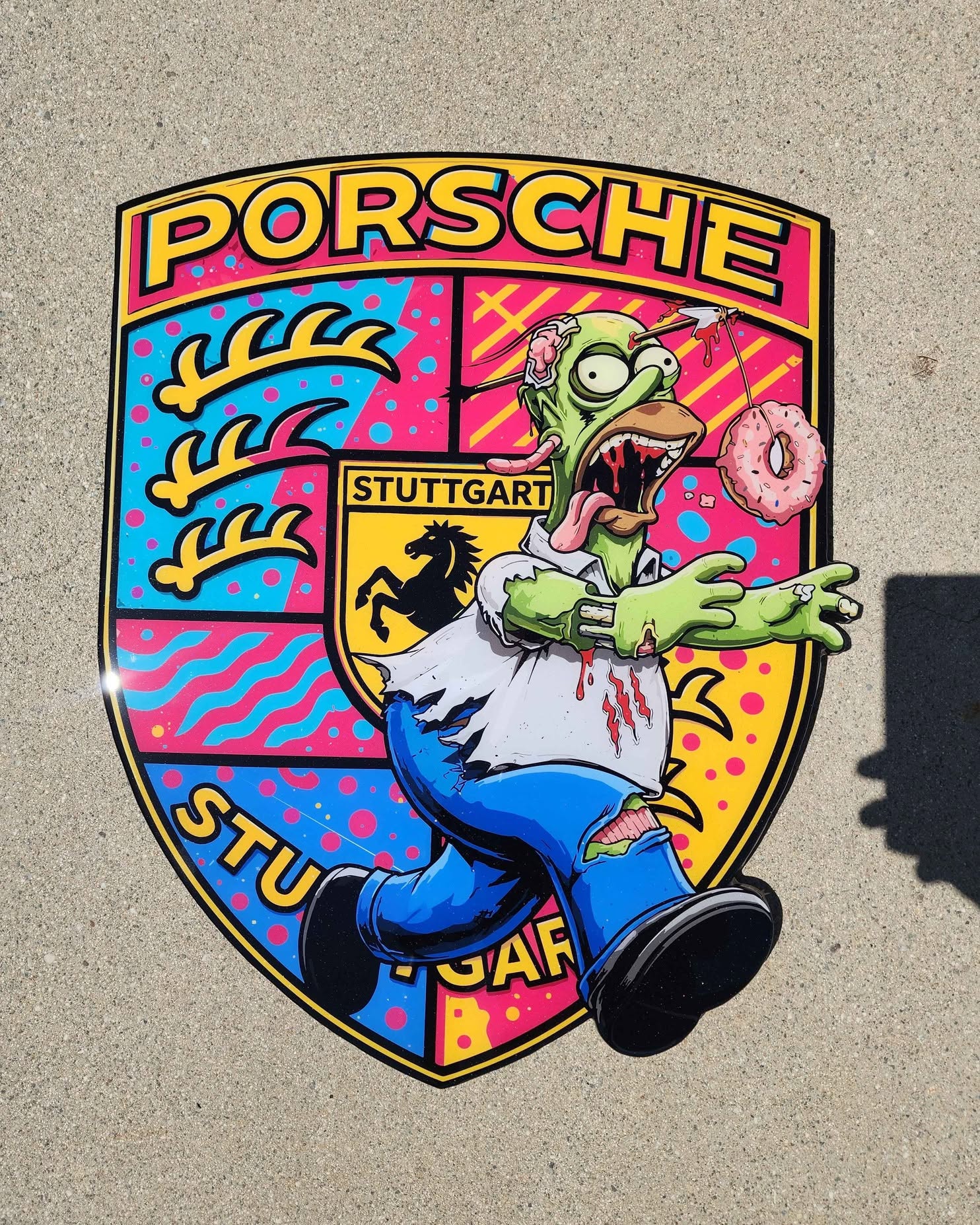 Samantha Aguilar Facebook ad: The Simpsons Porsche Wooden Garage Art, 18x22