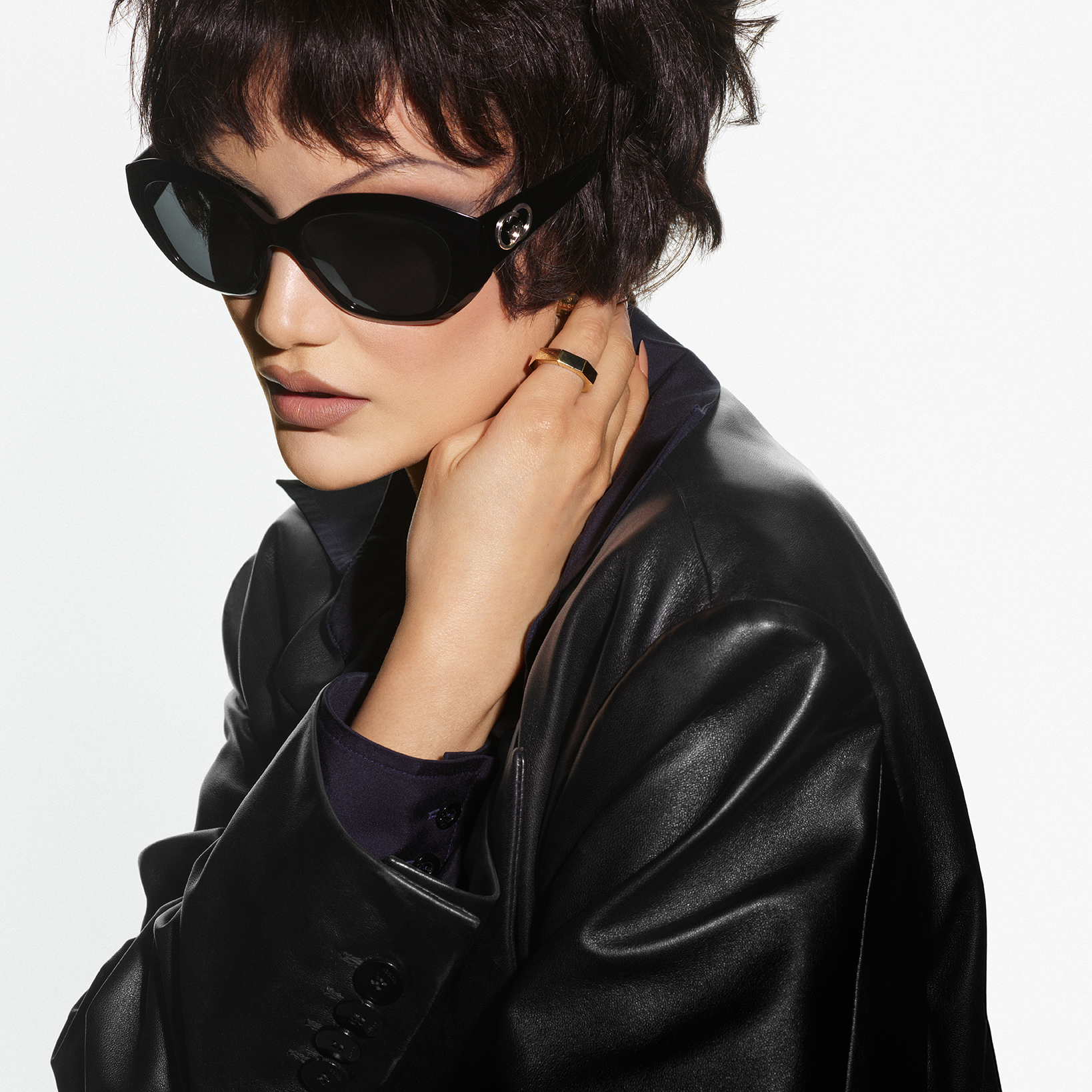 Gucci Facebook ad: New silhouettes, signature designs.