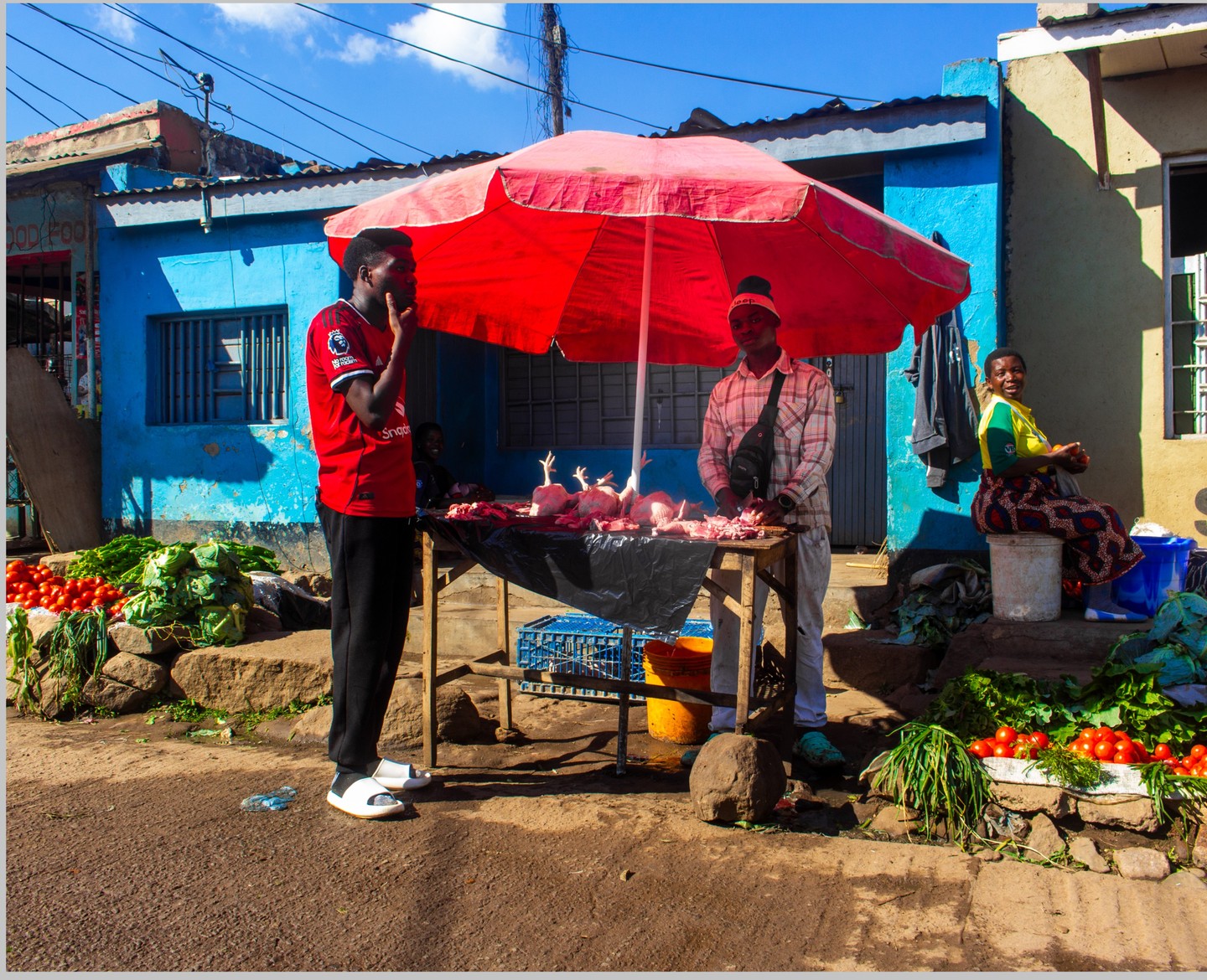 Canon Central & North Africa Facebook ad: Blue walls, a red umbrella, and the rhythm…