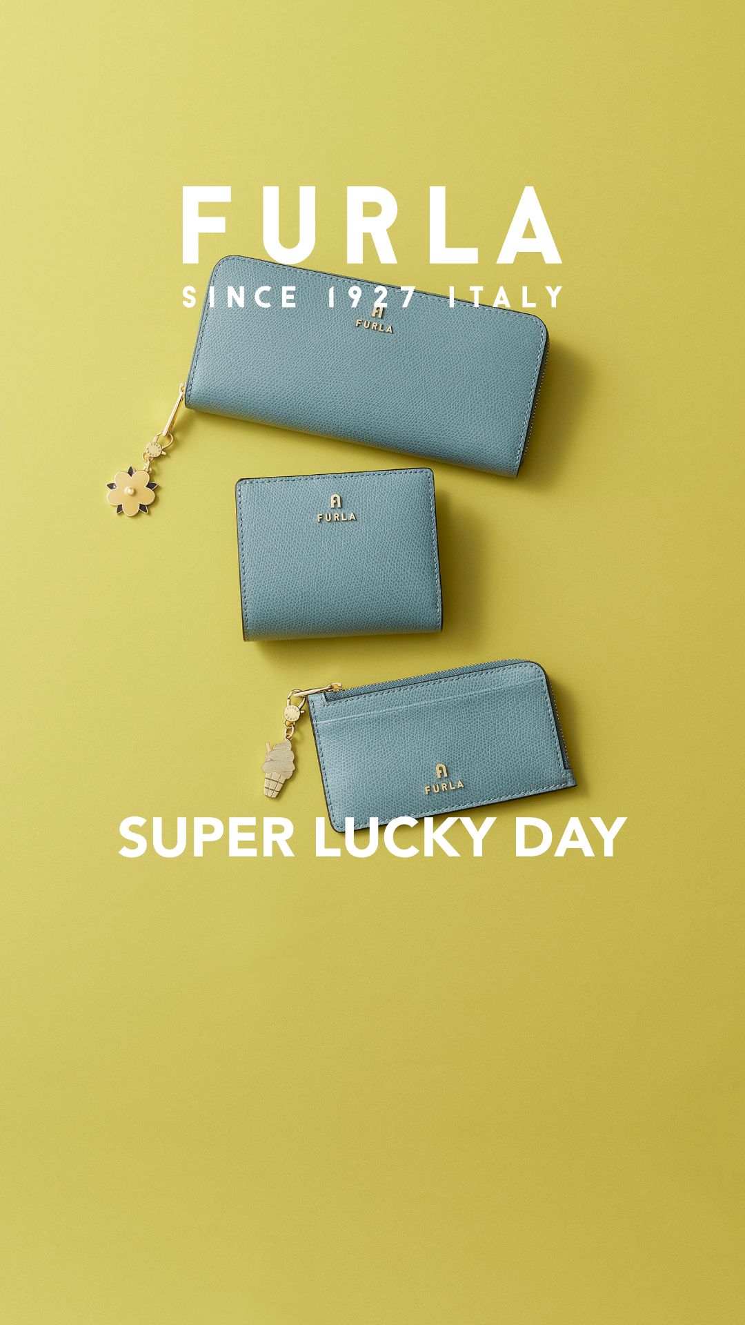Furla Facebook ad: 最強開運日に向けて、フルラのレザーグッズとチャームで運気も気分もアップ。上質な素材と色とりどりのカラーバリエーションか…