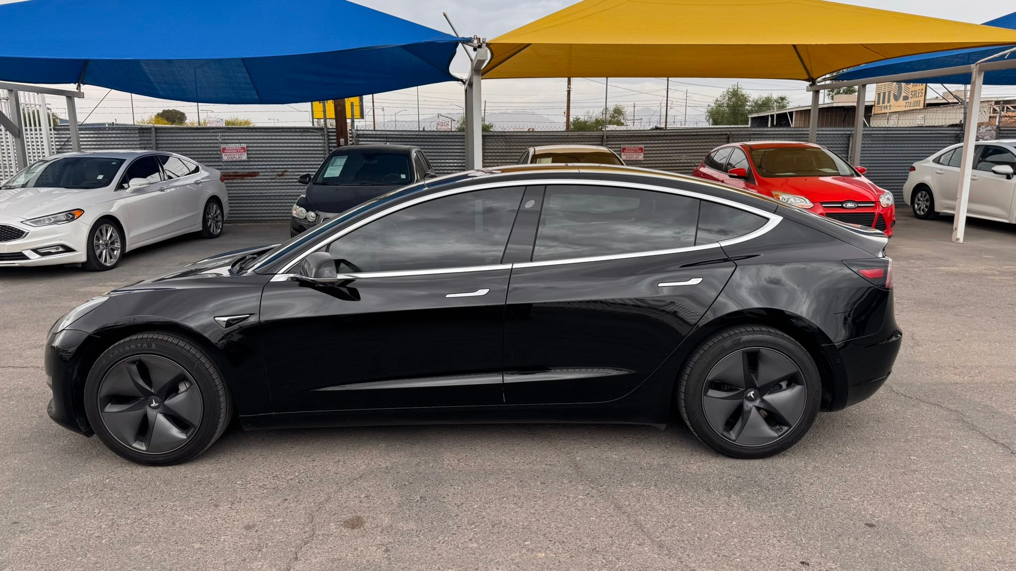 Epic Auto Sales Facebook ad: 2018 Tesla Model 3, Clean Title Low Miles!