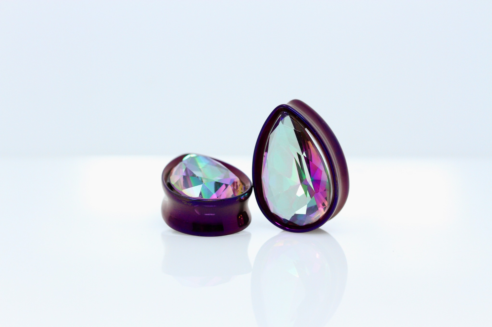 Two Feather Plugs Facebook ad: GEMS for Stretched Ears