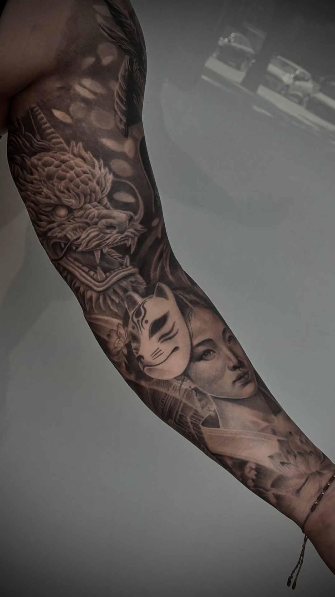 Cano Tattoo Facebook ad: Brazo realista con temática japonesa para mi chaval…