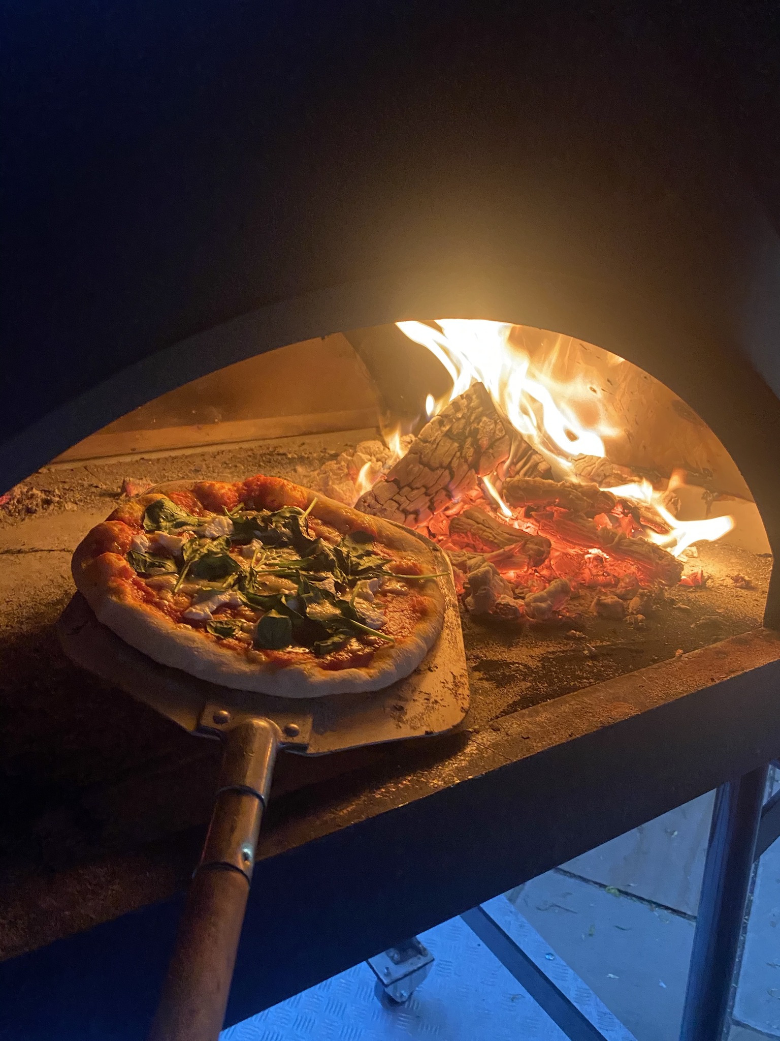 Pizza and Pig Facebook ad: At Pizza and Pig, we combine the best…