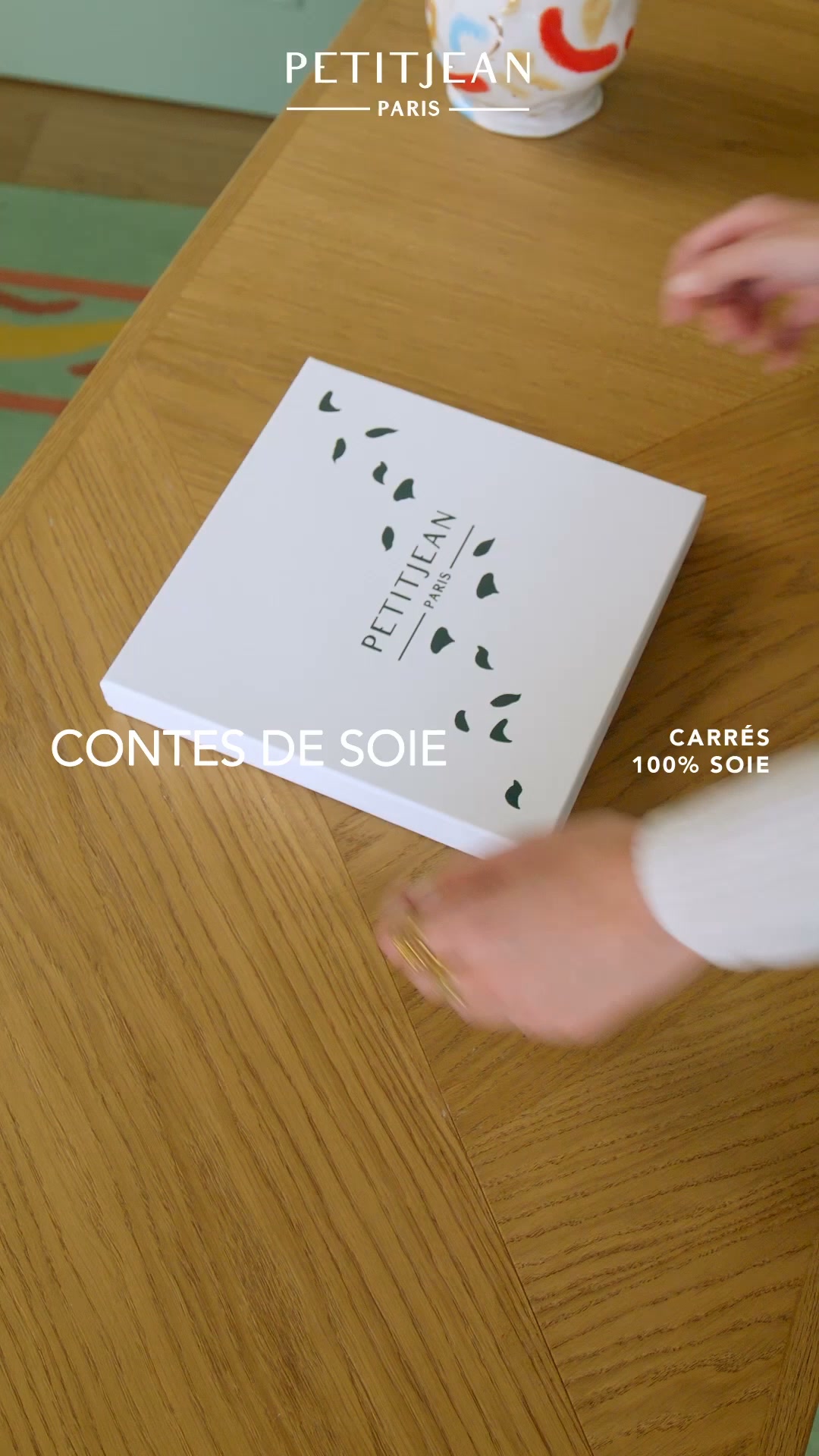 Petitjean Paris Facebook ad: Un conte de soie à offrir