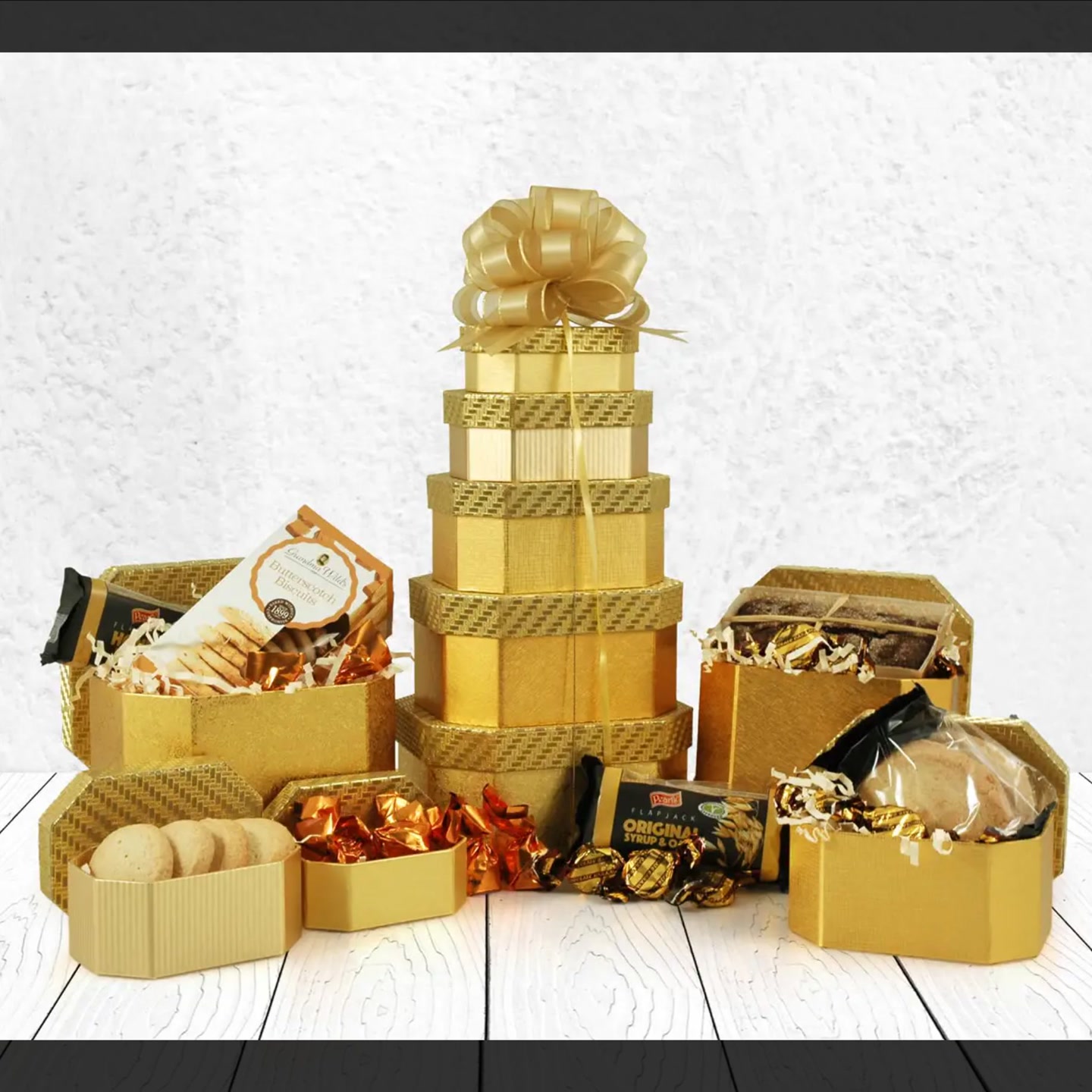 Hampergifts.co.uk Facebook ad: Cookies & Cake Tower Hamper