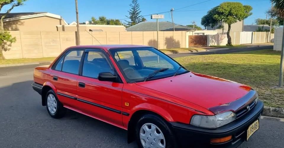 used car dealership Facebook ad: R12 000 00 TOYOTA COROLLA