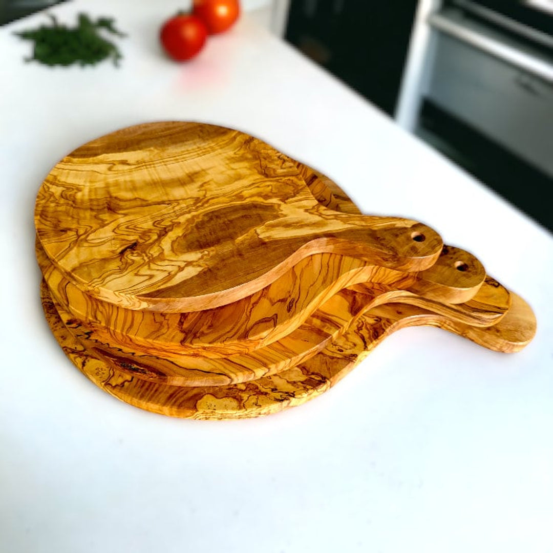 Olive Art Facebook ad: All natural, eco friendly olive wood from OliveArt.