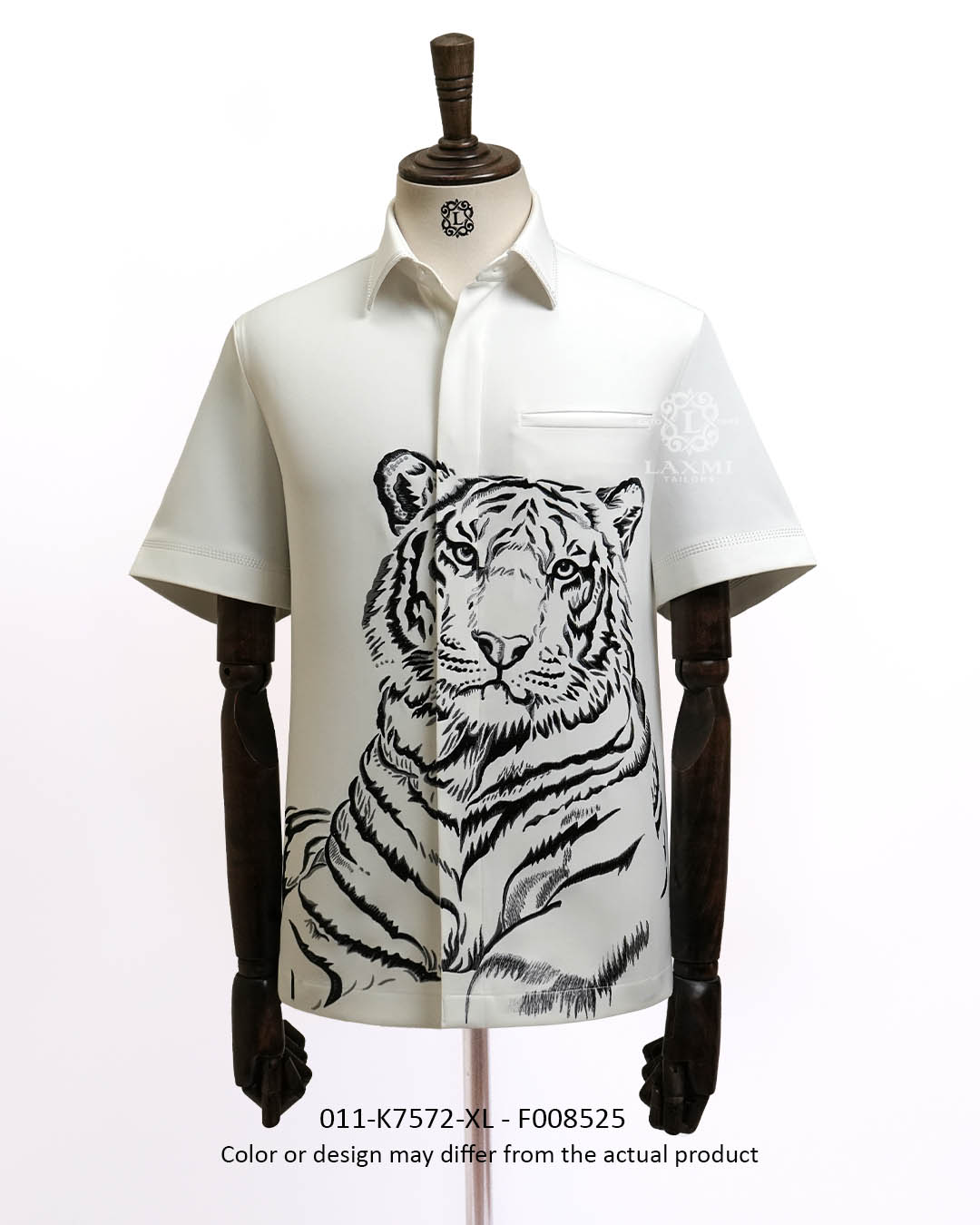Laxmi Tailors Facebook ad: Hand-embroidered. Bold artwork.