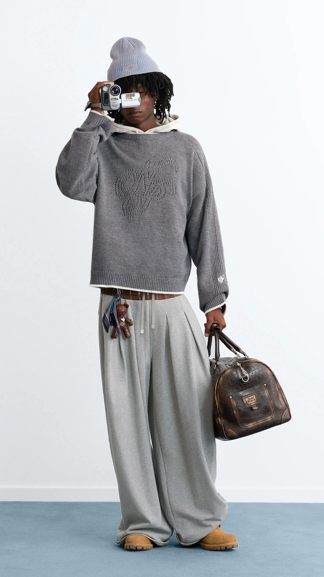 Nude Project Facebook ad: The Employee of the Month Knit Sweater Ash