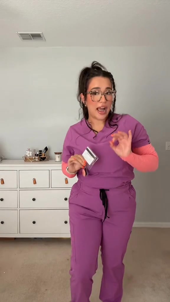 Medgear Facebook ad: Olivia Scrubs, 15% Off & FREE Shipping!