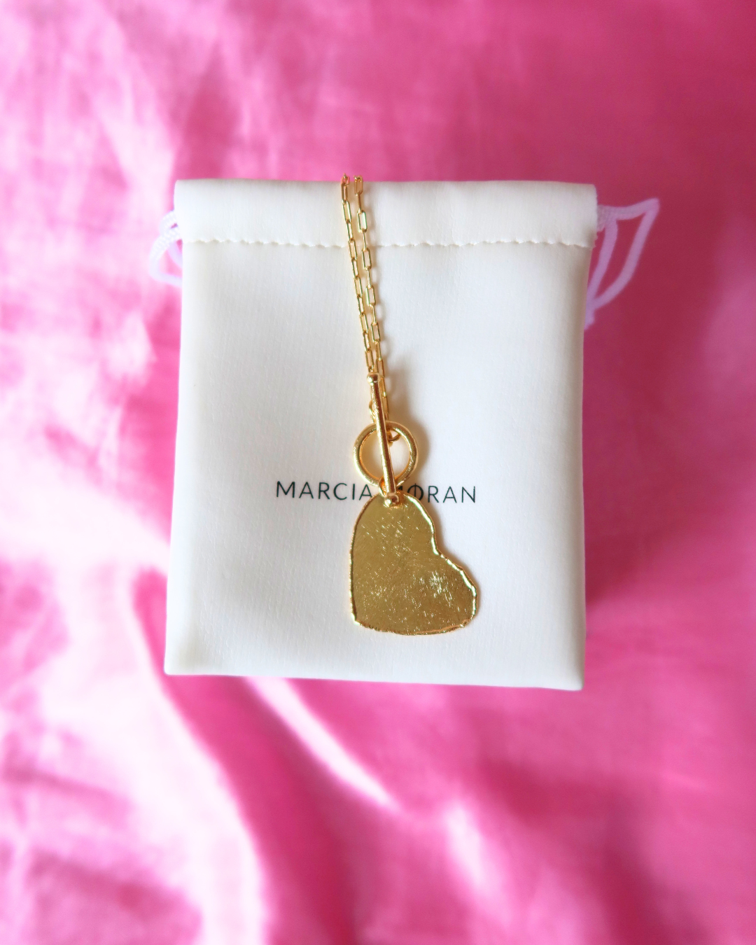 Marcia Moran Facebook ad: No look is complete without jewelry.