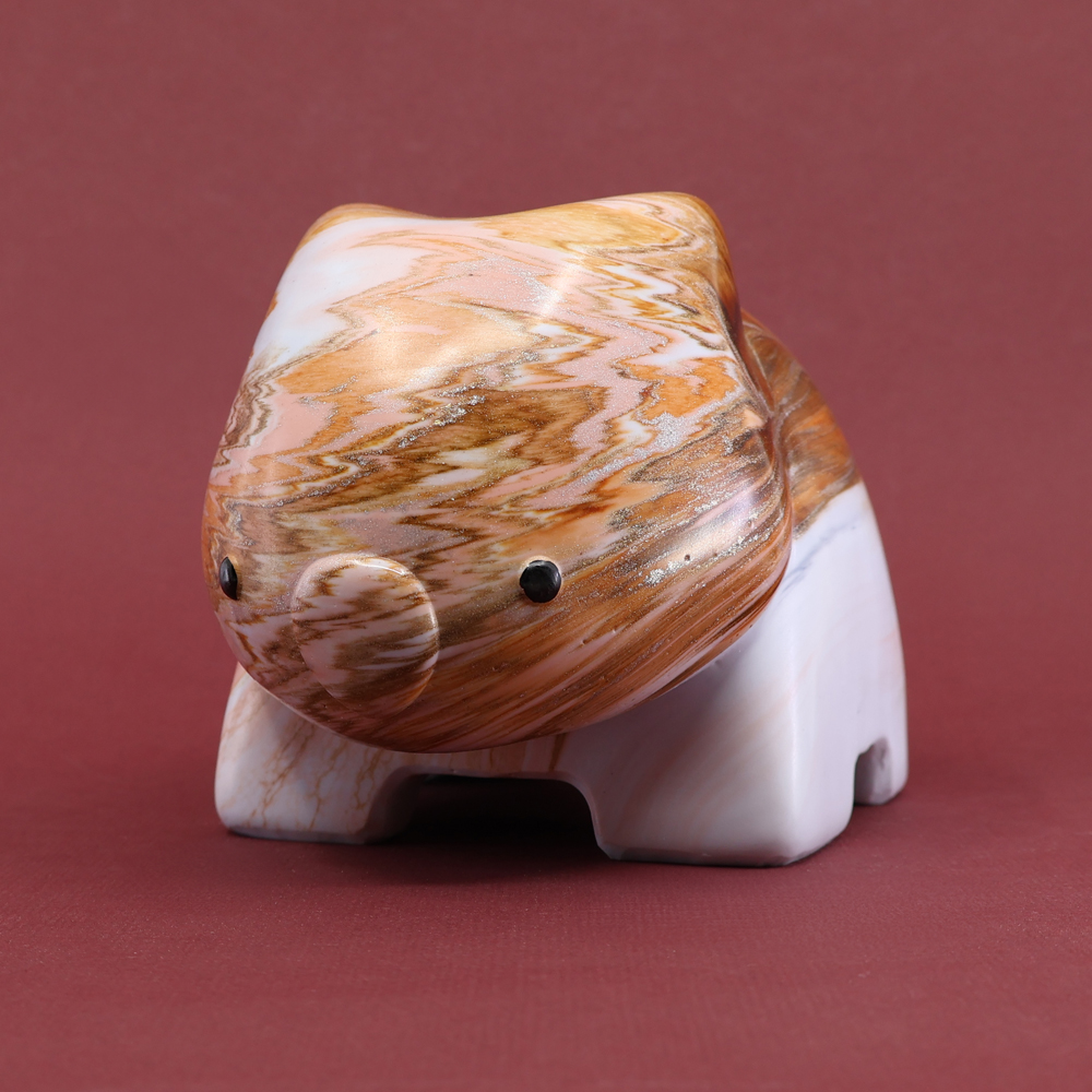 Pete Cromer Facebook ad: Discover adorable resin wombat sculptures