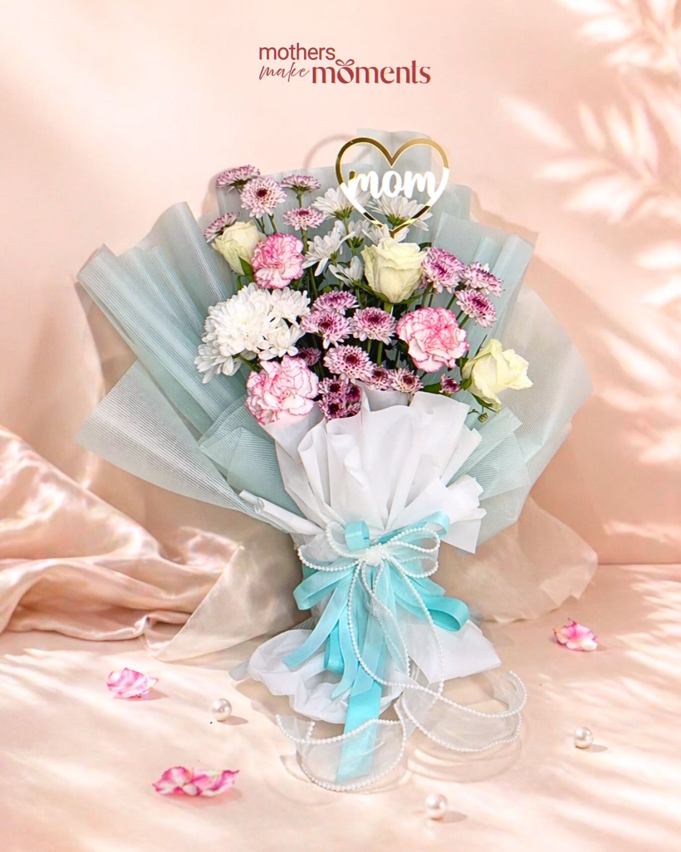 Moments Gift Shop Facebook ad: Mothers make moments, make hers unforgettable.
