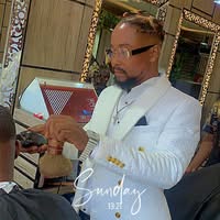 Dewise Effiong Facebook ad: The CEO of black global barbershop,a music artist…