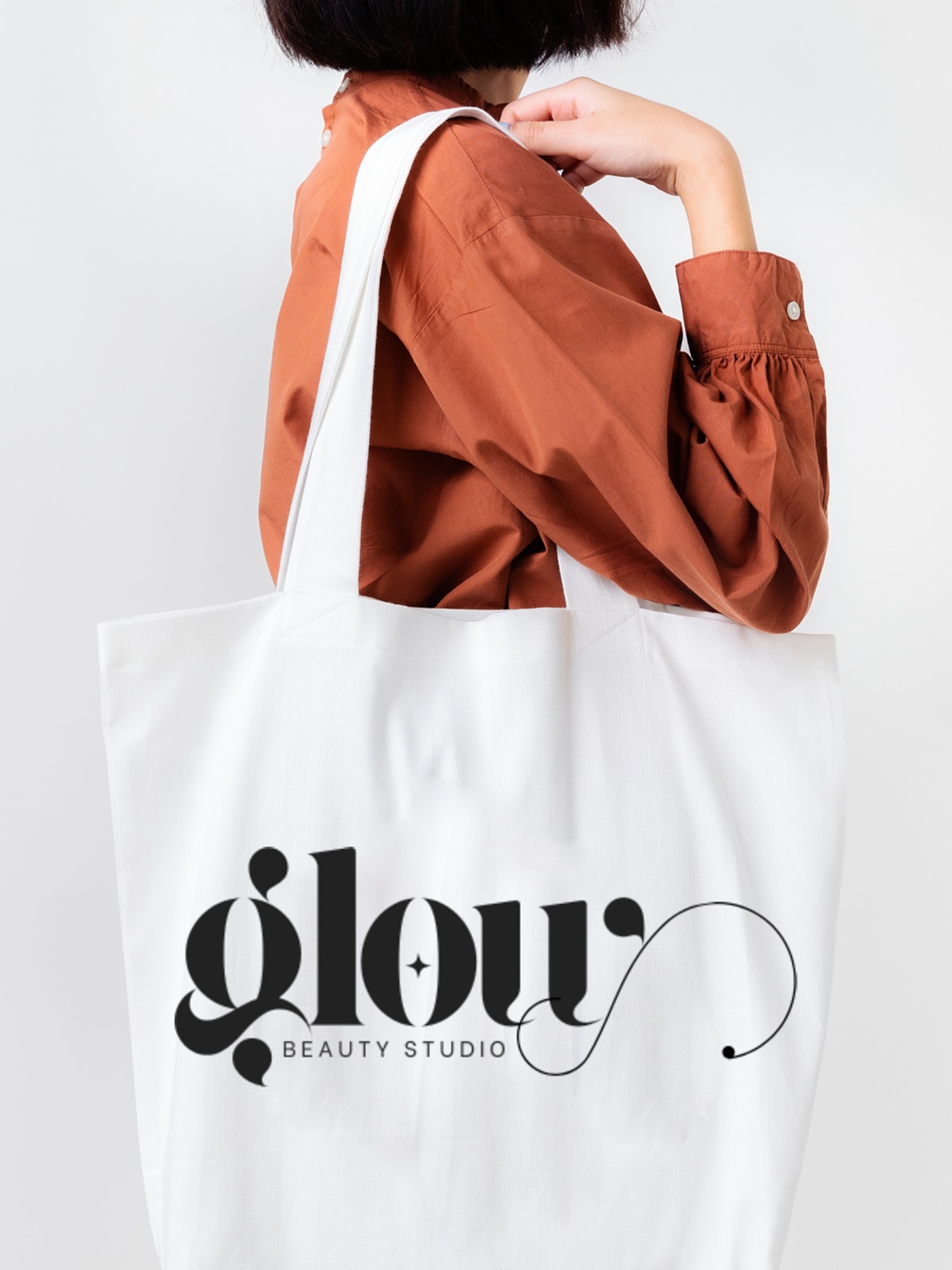 The Premade Shop Facebook ad: Glow is a modern typography logo combined with…