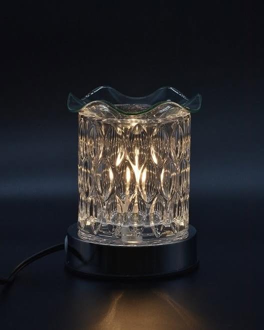 Jeannette August Facebook ad: Clear Glass and Electric Oil Warmer SG-T-0200