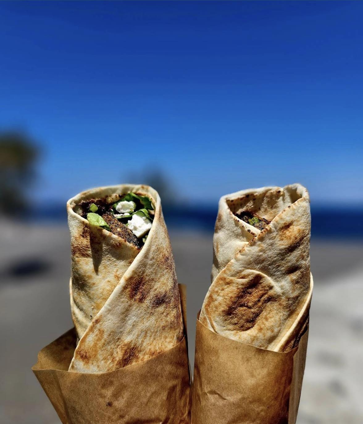 Falafeland Santorini Facebook ad: Wrapped with flavor