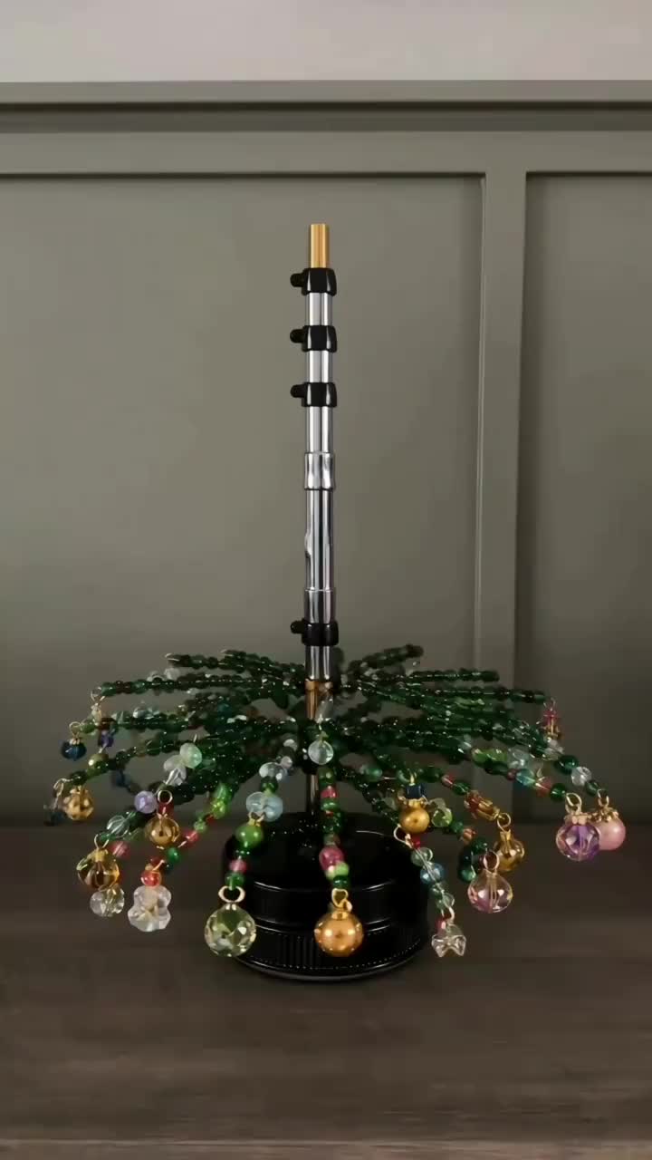 AileSeine Facebook ad: Kit DIY Perles de Noël: Créez des Décorations Uniques!