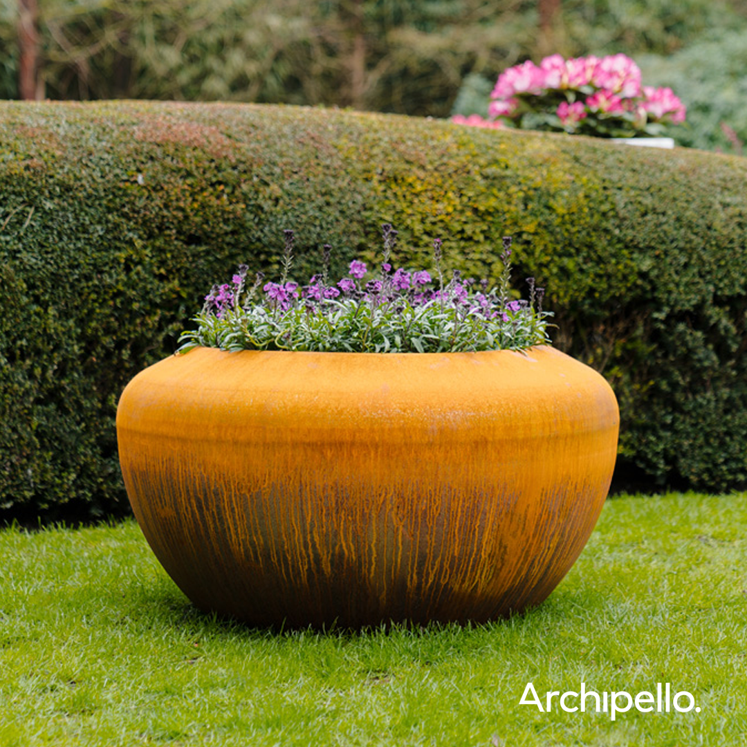 Archipello. Facebook ad: Enhance outdoor spaces with architectural steel planters…