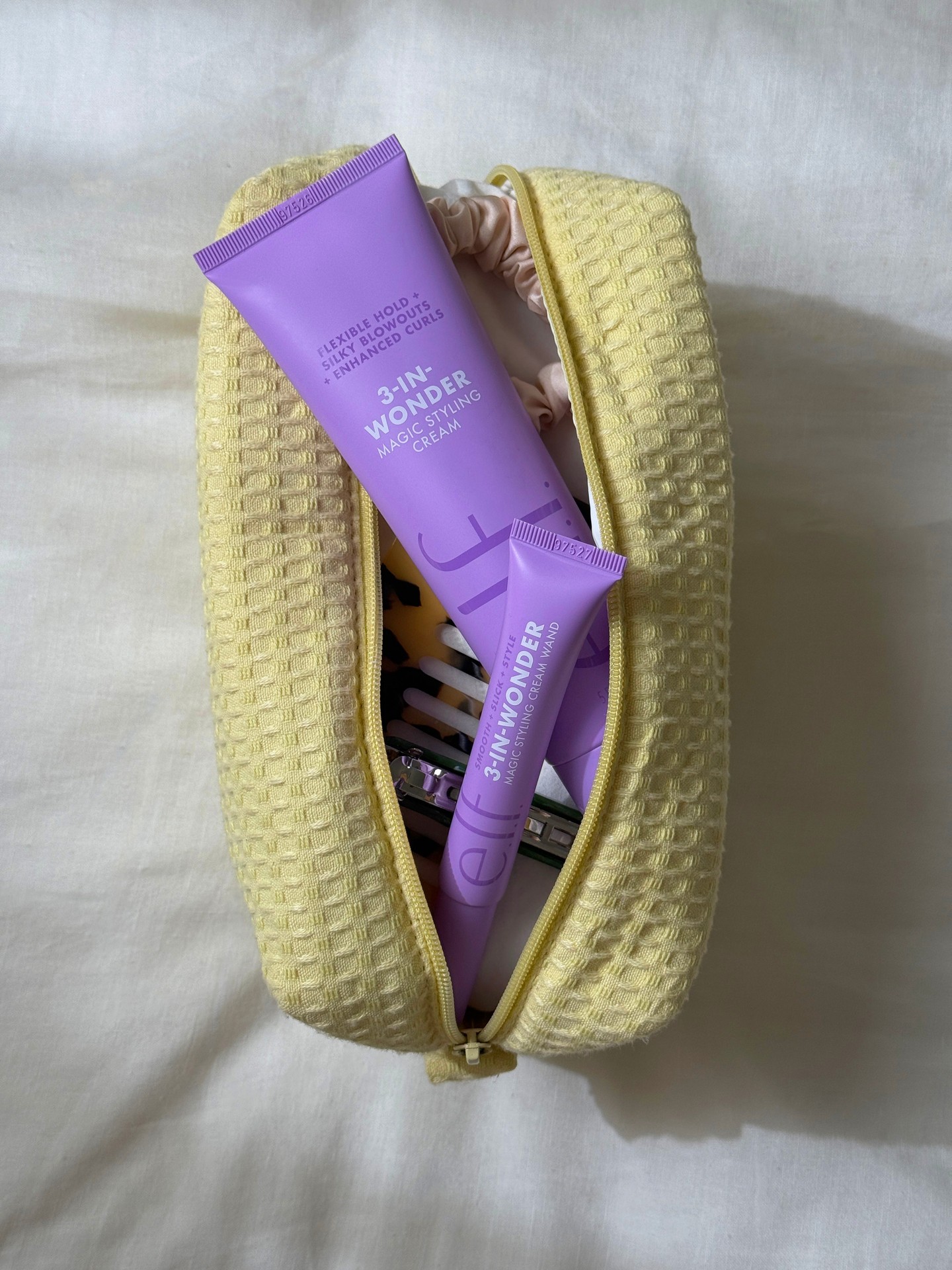 elf HAIR Facebook ad: Our makeup bag must-haves