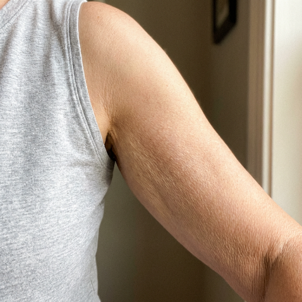 Susan Mitchell Facebook ad: STOP putting firming lotion on your arms. It's not…