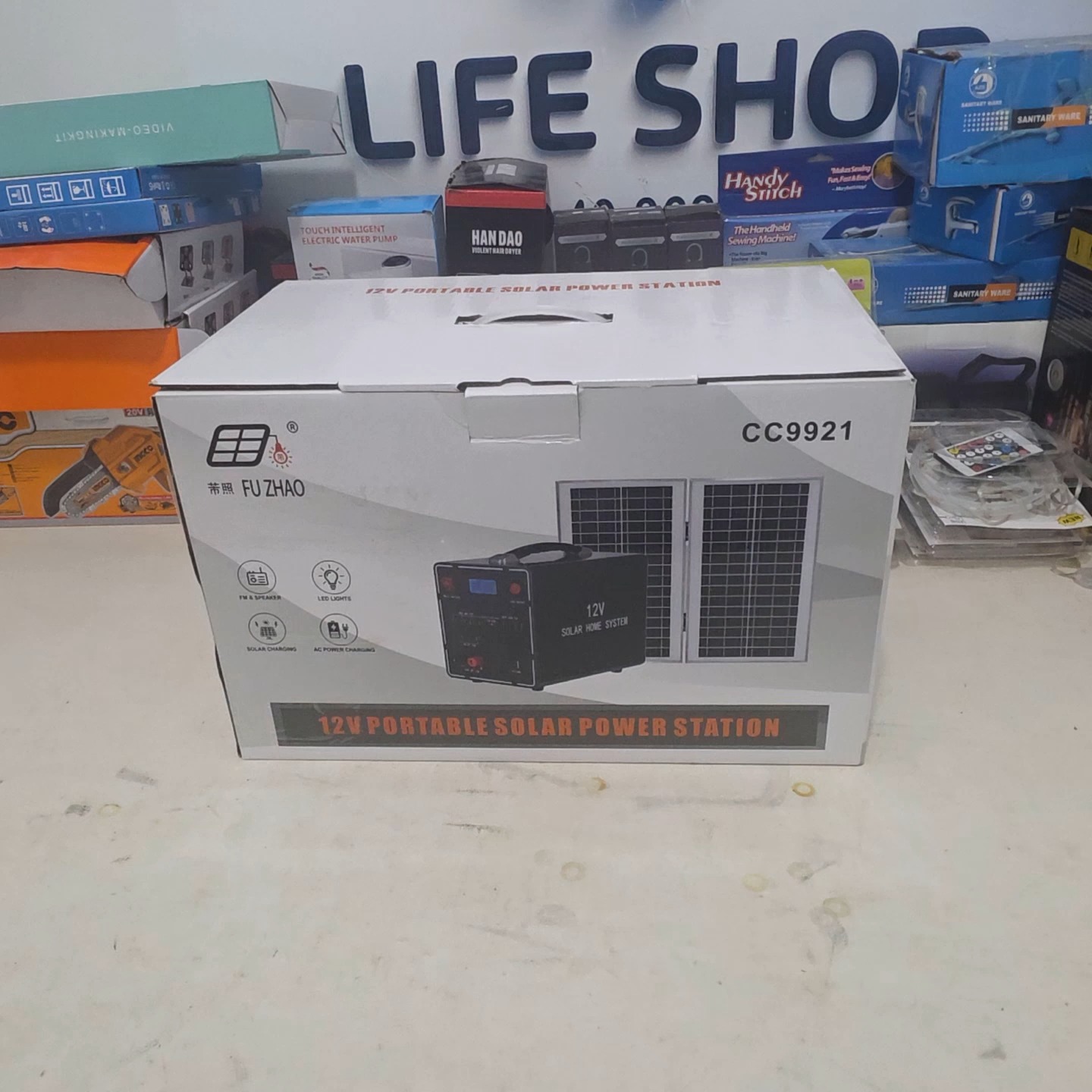 Life is a Shop Facebook ad: تهنّى من قصان الضوء وخدّمو معك وين ما…