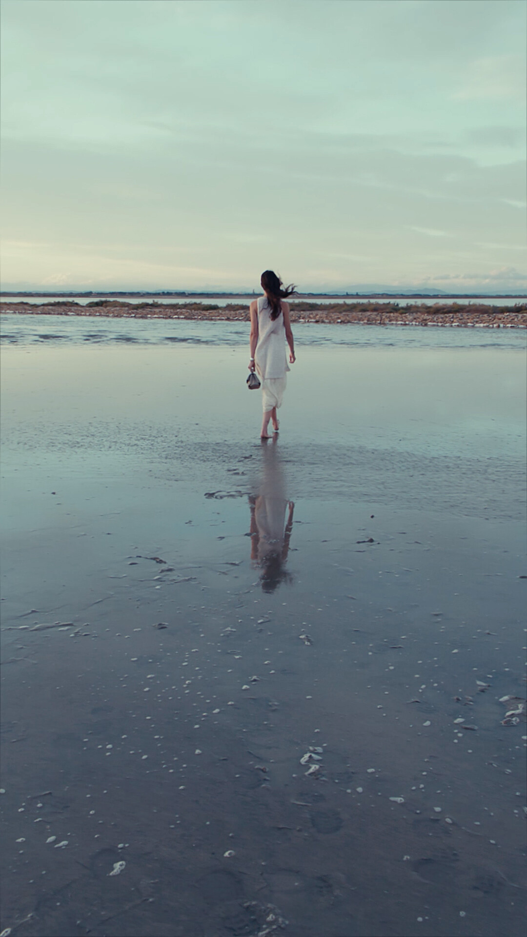 Polène Facebook ad: Between sky and sea, she walks through the…