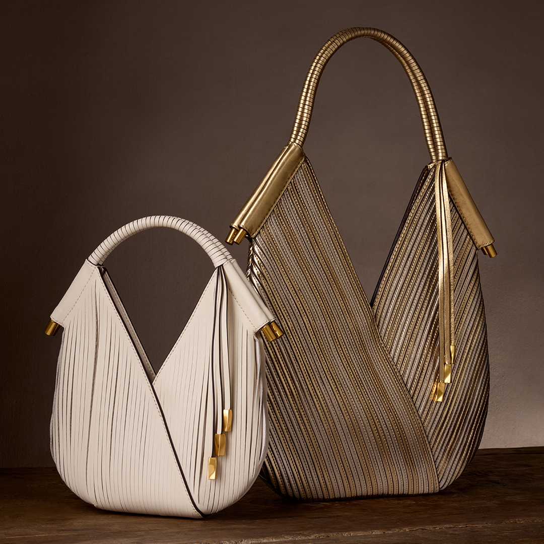 Donna Karan New York Facebook ad: Shop Holiday handbags today.