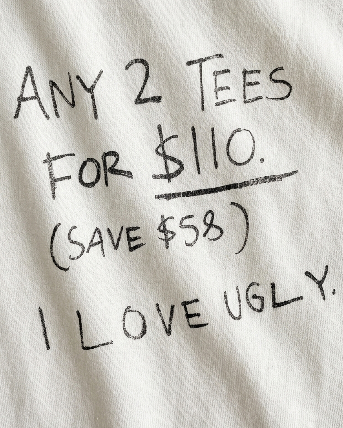 I Love Ugly Facebook ad: 2 For $110. Premium Tees.