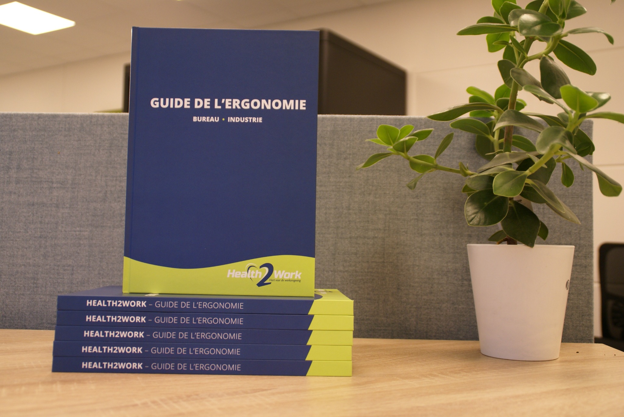Health2Work België Facebook ad: Demandez dès maintenant le Guide de l’Ergonomie gratuit!