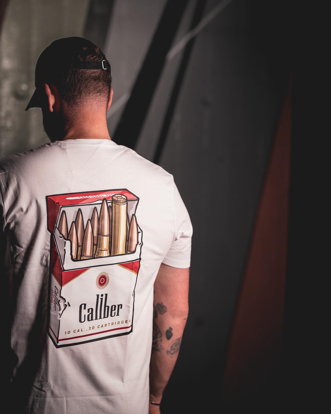 dark.divisions_uk Facebook ad: The Caliber T-shirt is now live