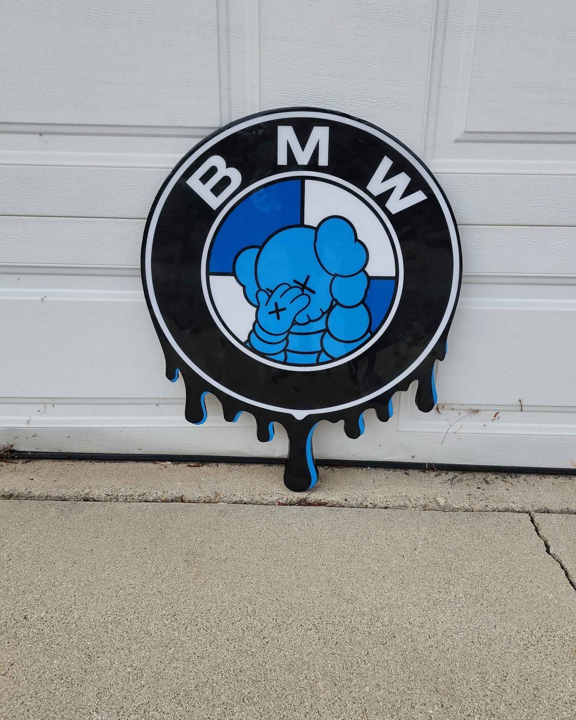 Samantha Aguilar Facebook ad: BMW Michellin Man Wooden Garage Sign, 24inch