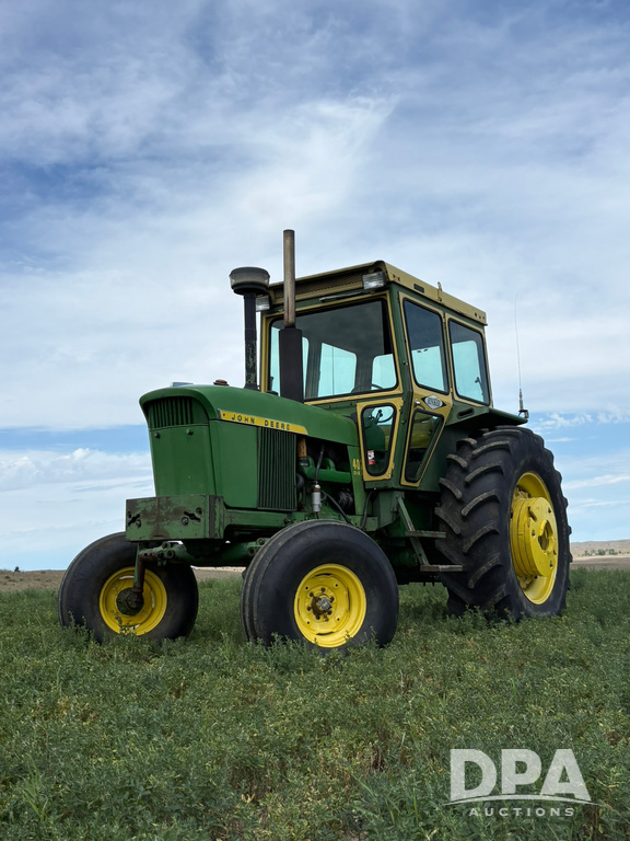 DPA Auctions Facebook ad: John Deere 4020 tractor, 608C corn header, and…