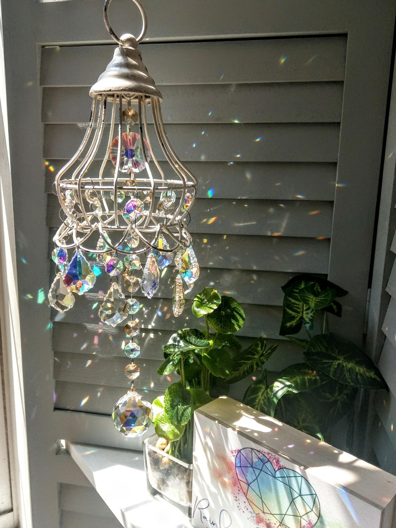 Rainbows and Whimsy Facebook ad: Crystal Suncatchers To
