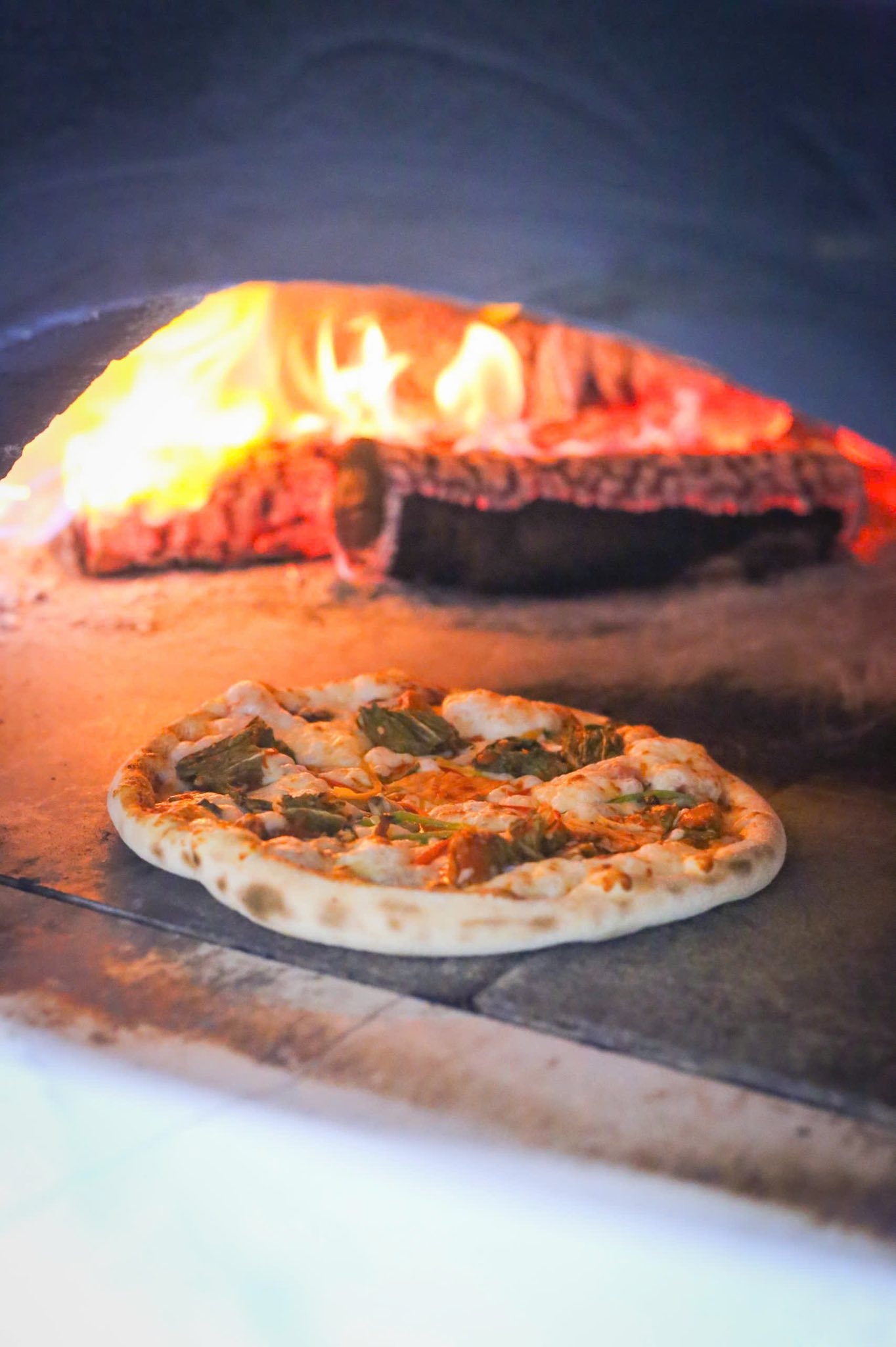 Ngựa Hoang Pizza & Eatery Facebook ad: 𝑻𝑬̂́𝑻 𝑵𝑨̀𝒀 𝑽𝑬̂̀ 𝑸𝑼Ê, 𝑻𝑯𝑼̛̉ 𝑴𝑶̣̂𝑻 𝑪𝑯𝑼́𝑻…