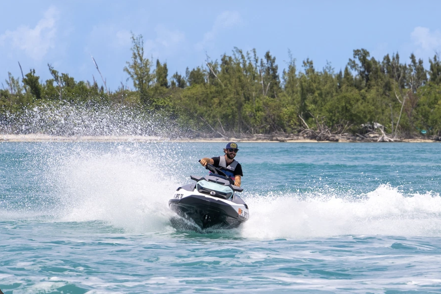 Spur Experiences Facebook ad: Ride the waves on jet skis, soar above…