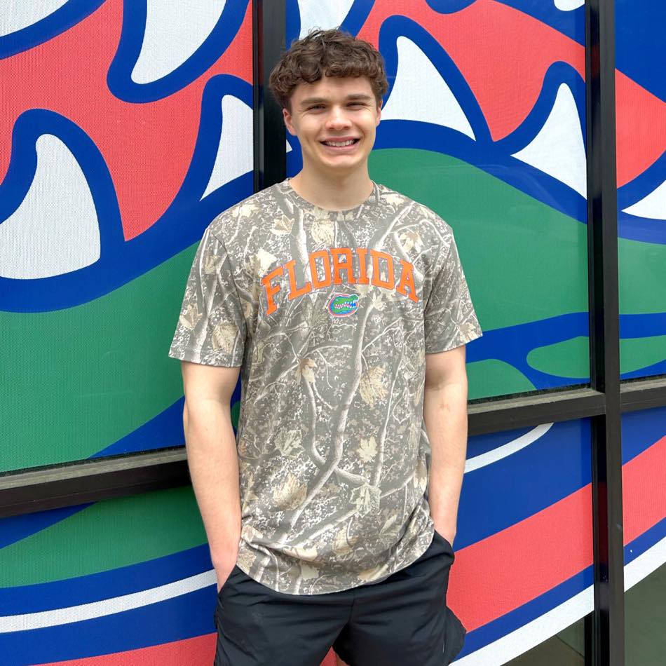 Alumni Hall UF Facebook ad: Florida Uscape Commons Arch Camo Tee