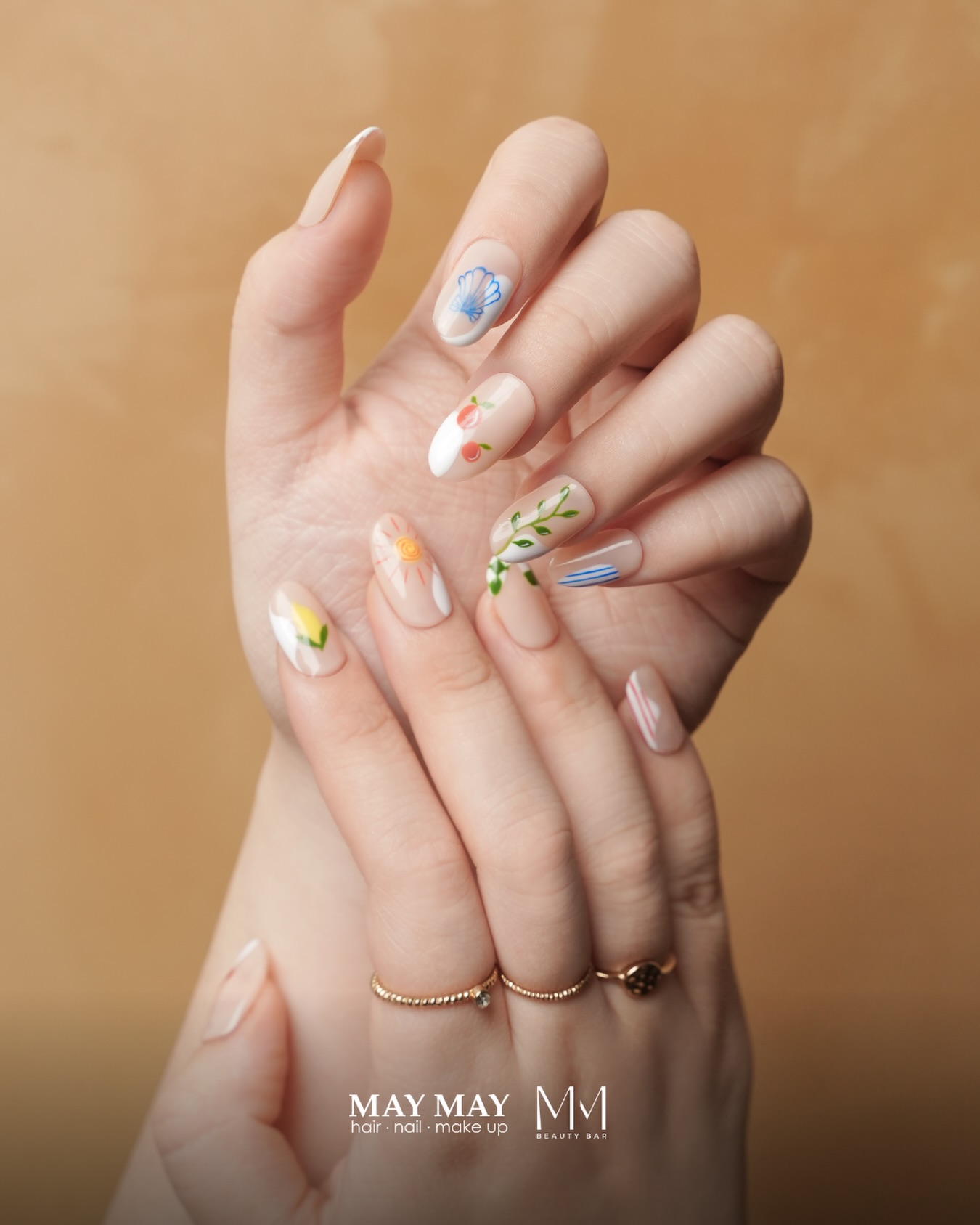 May-May Beauty Bar Facebook ad: Your nails but make it a garden!