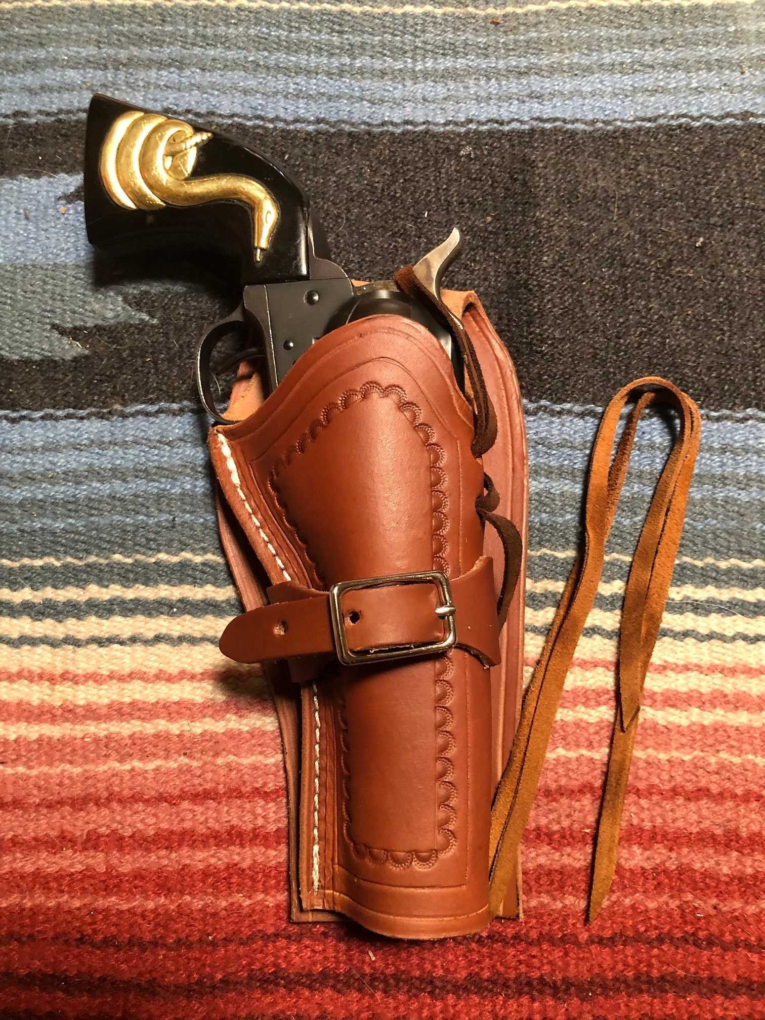 Insgifts Facebook ad: Cowboy Western Fast Draw Leather Holster Fits Colt SAA…